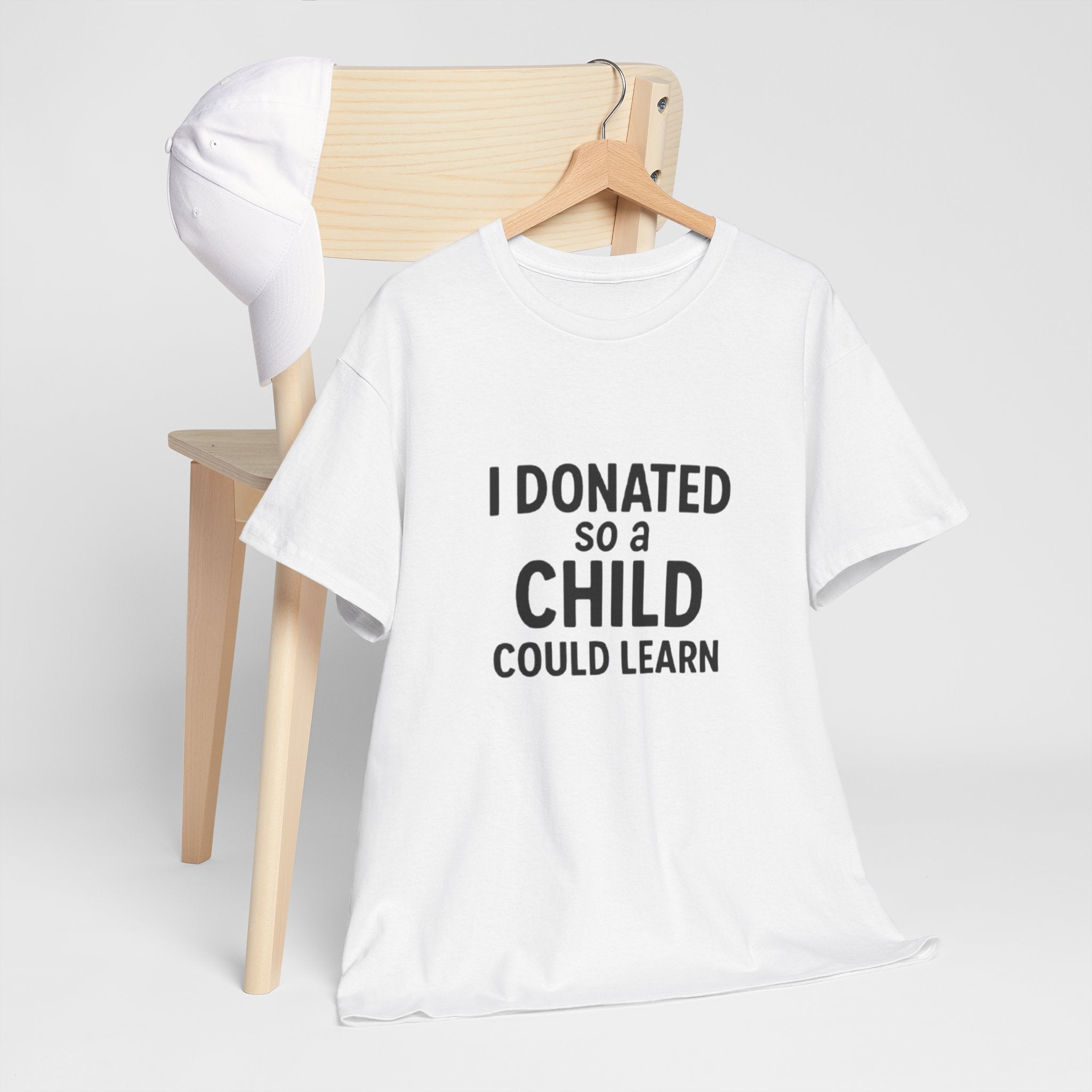 Unisex Heavy Cotton Tee - 'I Donated So a Child Could Learn' - Charity Awareness Shirt, Gift for Educators, Fundraiser Tee, Casual [...]